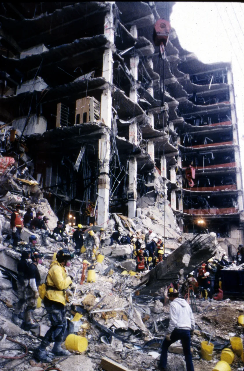 Image: Oklahoma City Bombing - Search and Rescue crews work to save those trapped beneath the debris (5)