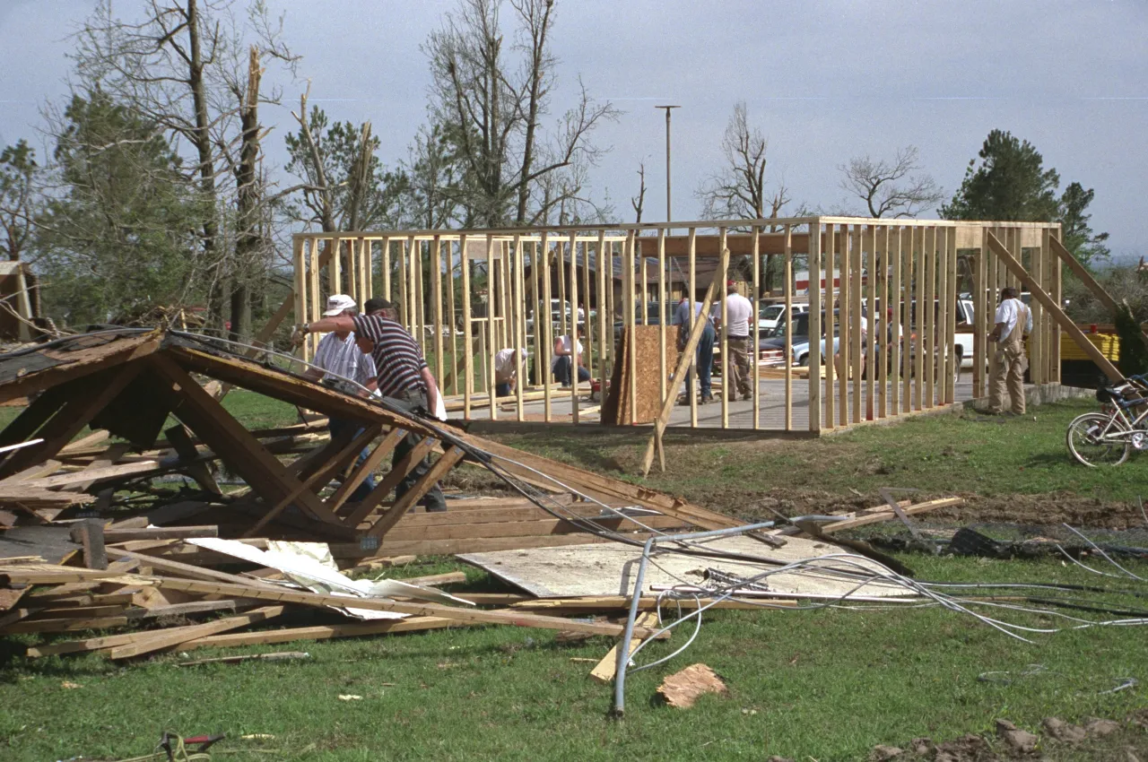 Image: Hurricane Andrew - Workers rebuild a house