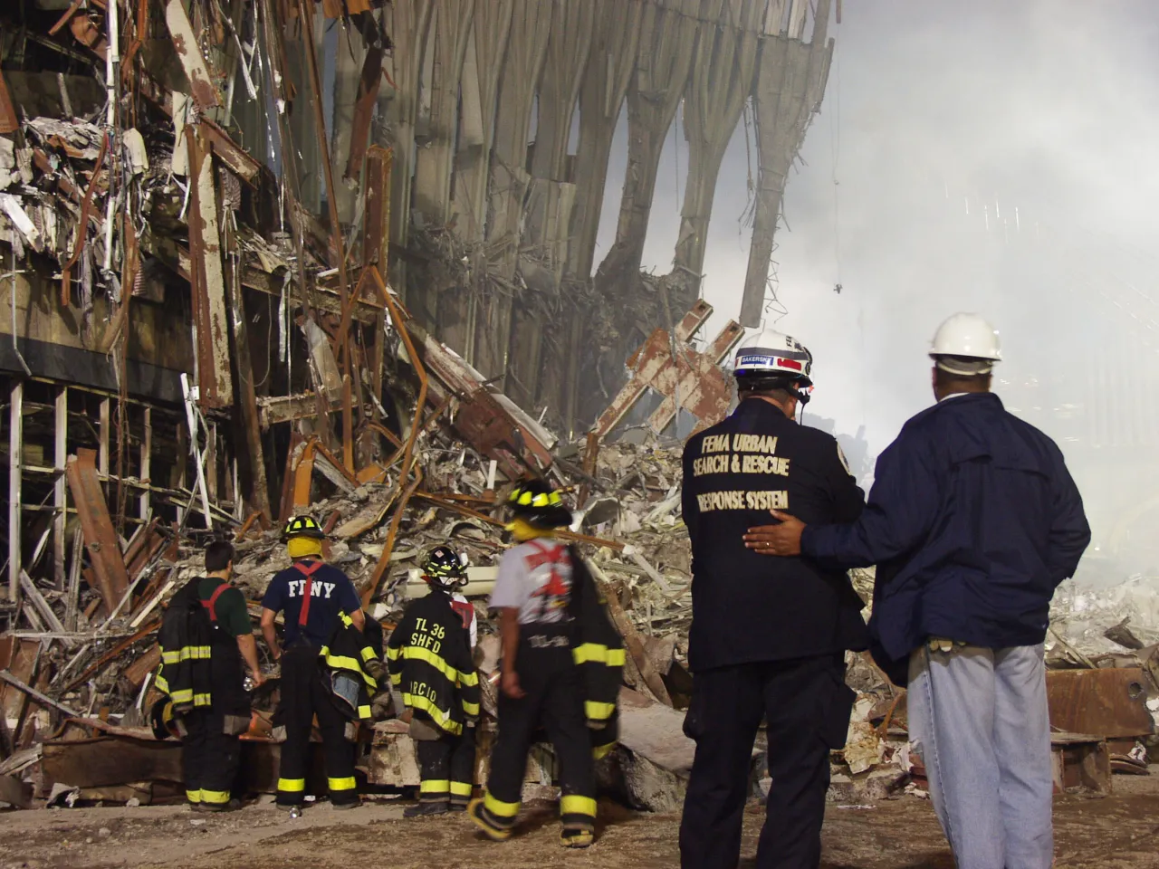 Image: 9/11 FEMA Officials and Urban Search and Rescue inspect Ground Zero