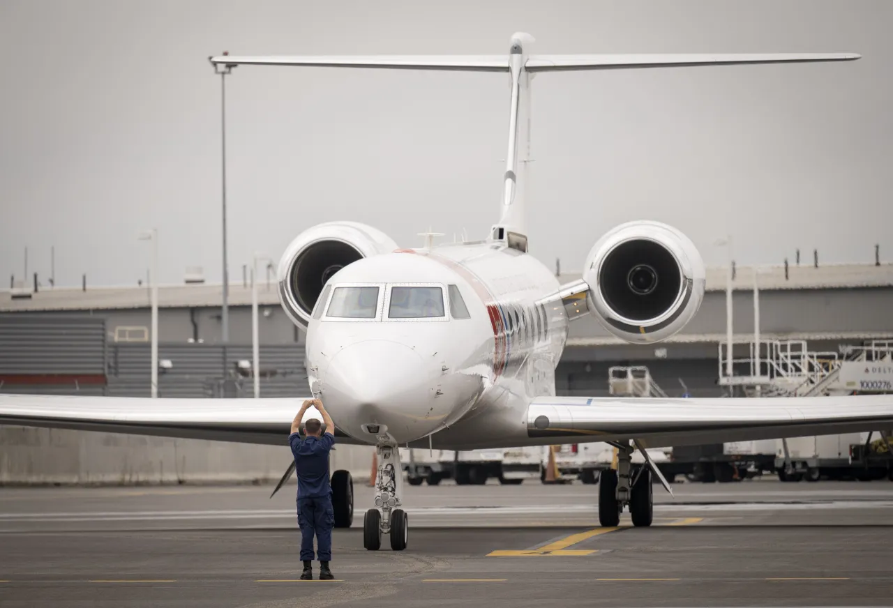 Image: DHS Secretary Alejandro Departs DCA to New York City (9)