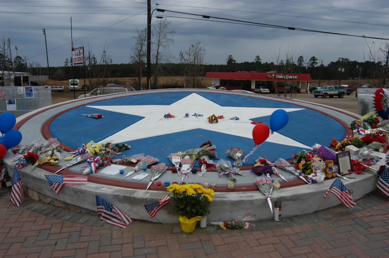 Image: Columbia Shuttle Disaster - A memorial is set up to honor the crew