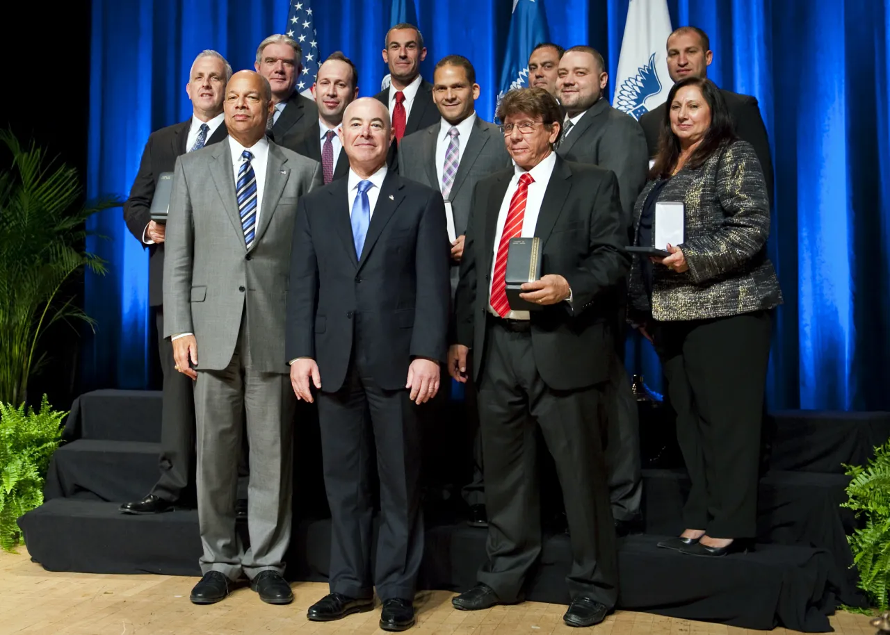 Image: The Secretary's Meritorious Service Award 2014 - El Dorado Task Force Financial Group VII