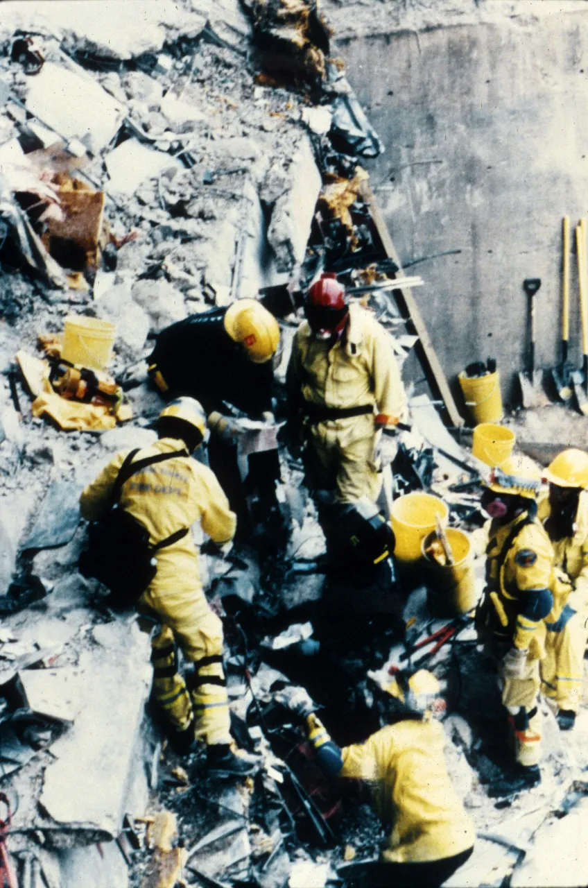 Image: Oklahoma City Bombing - Search and Rescue crews work to save those trapped beneath the debris (4)