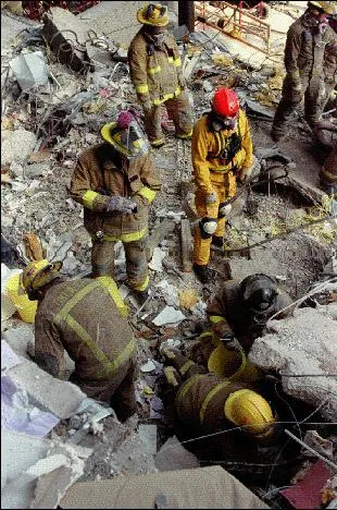 Image: Oklahoma City Bombing - Search and Rescue team surveys the damage (3)