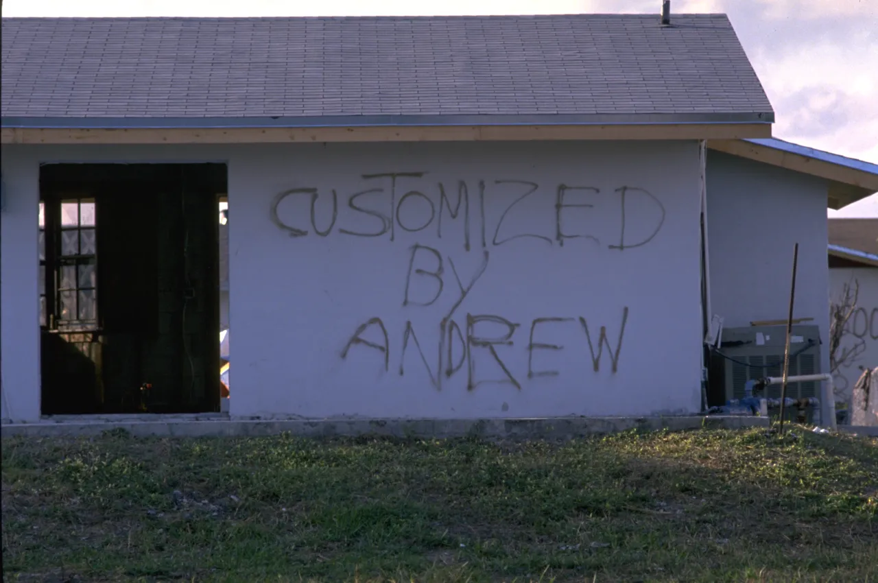 Image: Hurricane Andrew - A wall of a home reads "Customized by Andrew"