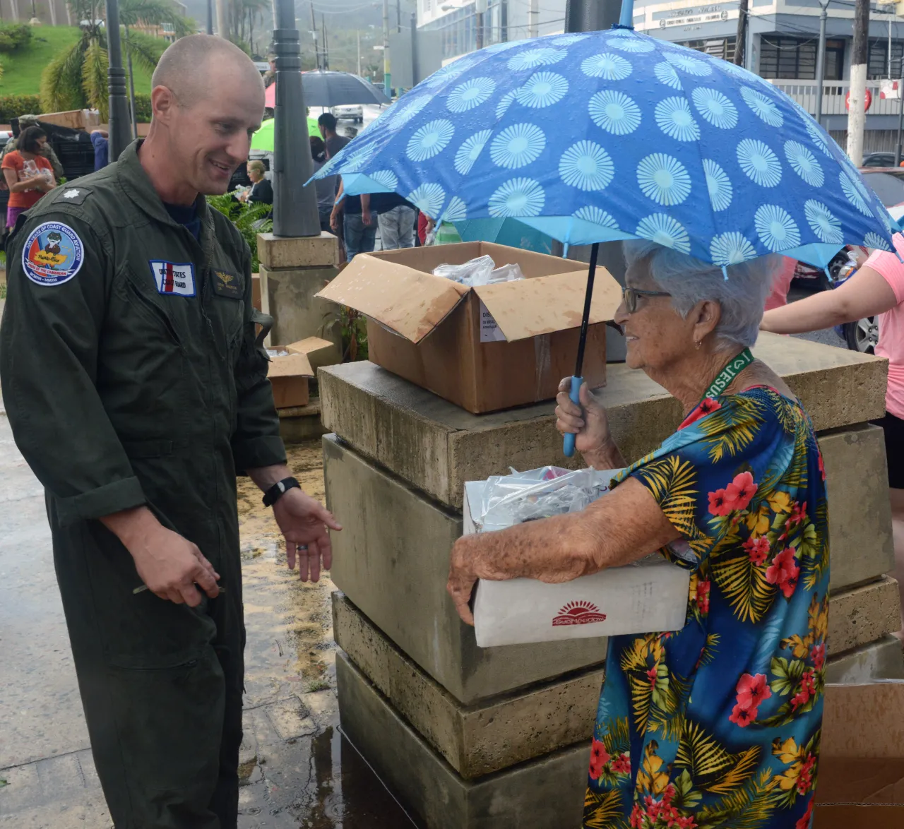 Image: Coast Guardsmen Cmdr. Jeremy Anderson deliver FEMA supplies to Hurricane Maria-affected areas of Puerto Rico