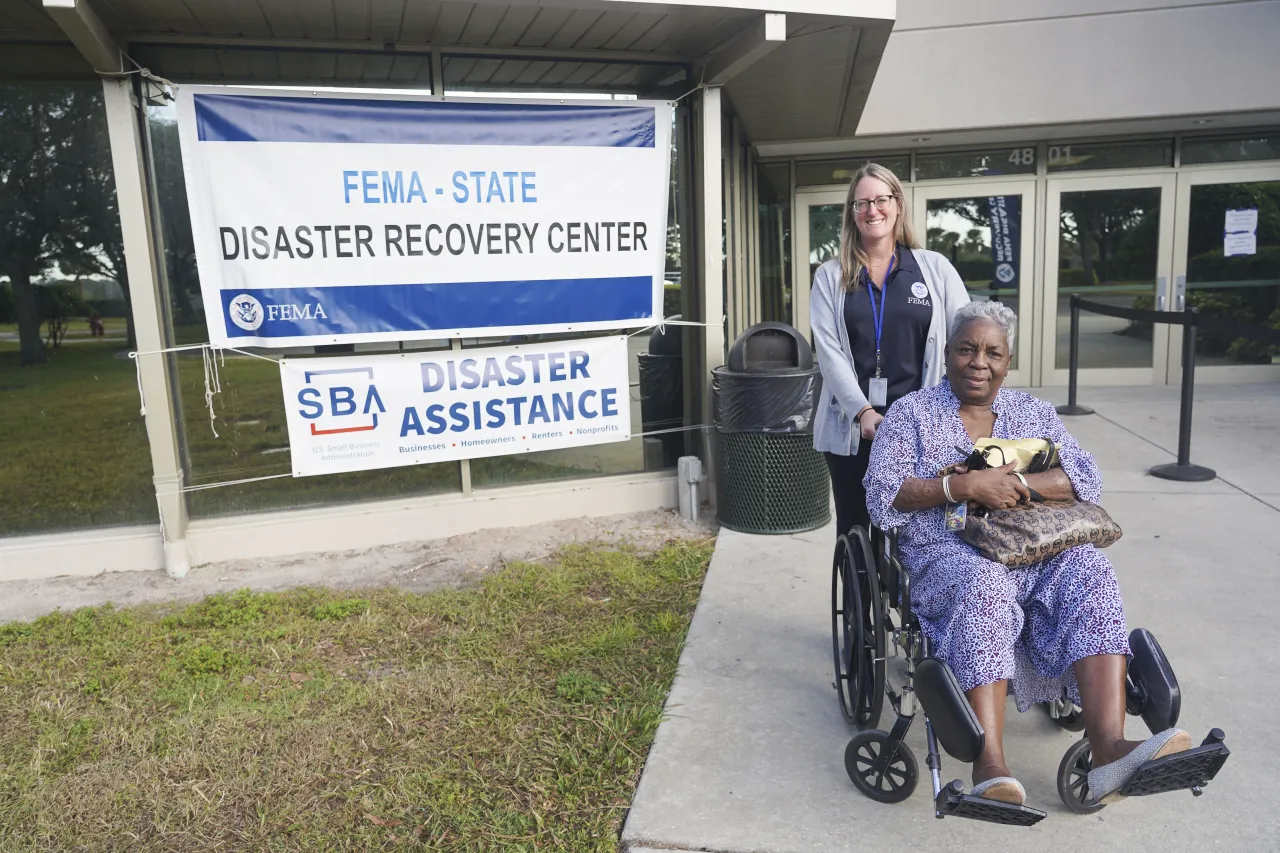 Image: FEMA Employee with a Hurricane Ian Survivor at a Disaster Recovery Center at Barnett Park Recreation Center