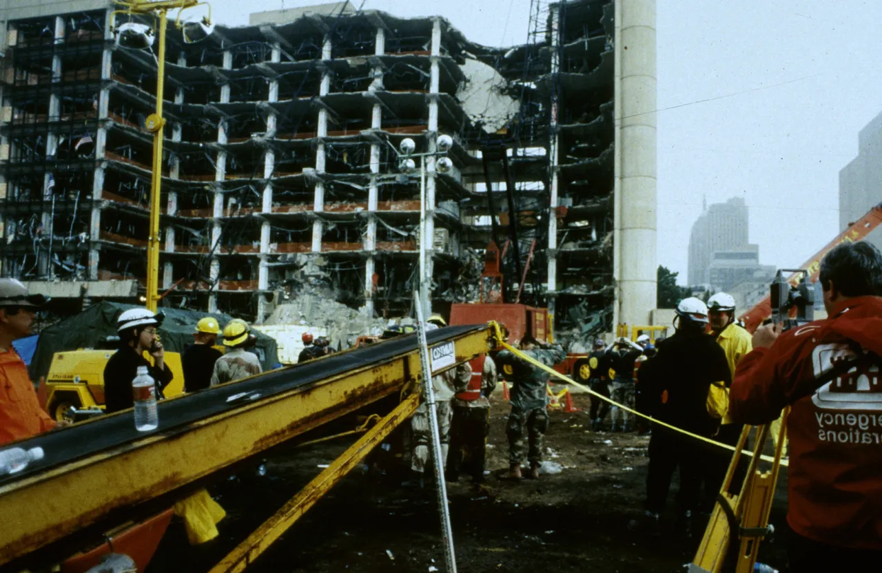 Image: Oklahoma City Bombing - Search and Rescue workers gather outside (2)