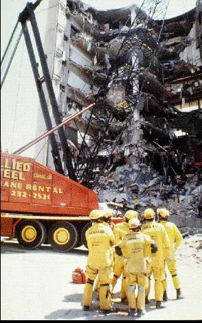 Image: Oklahoma City Bombing - Search and Rescue team surveys the damage (4)