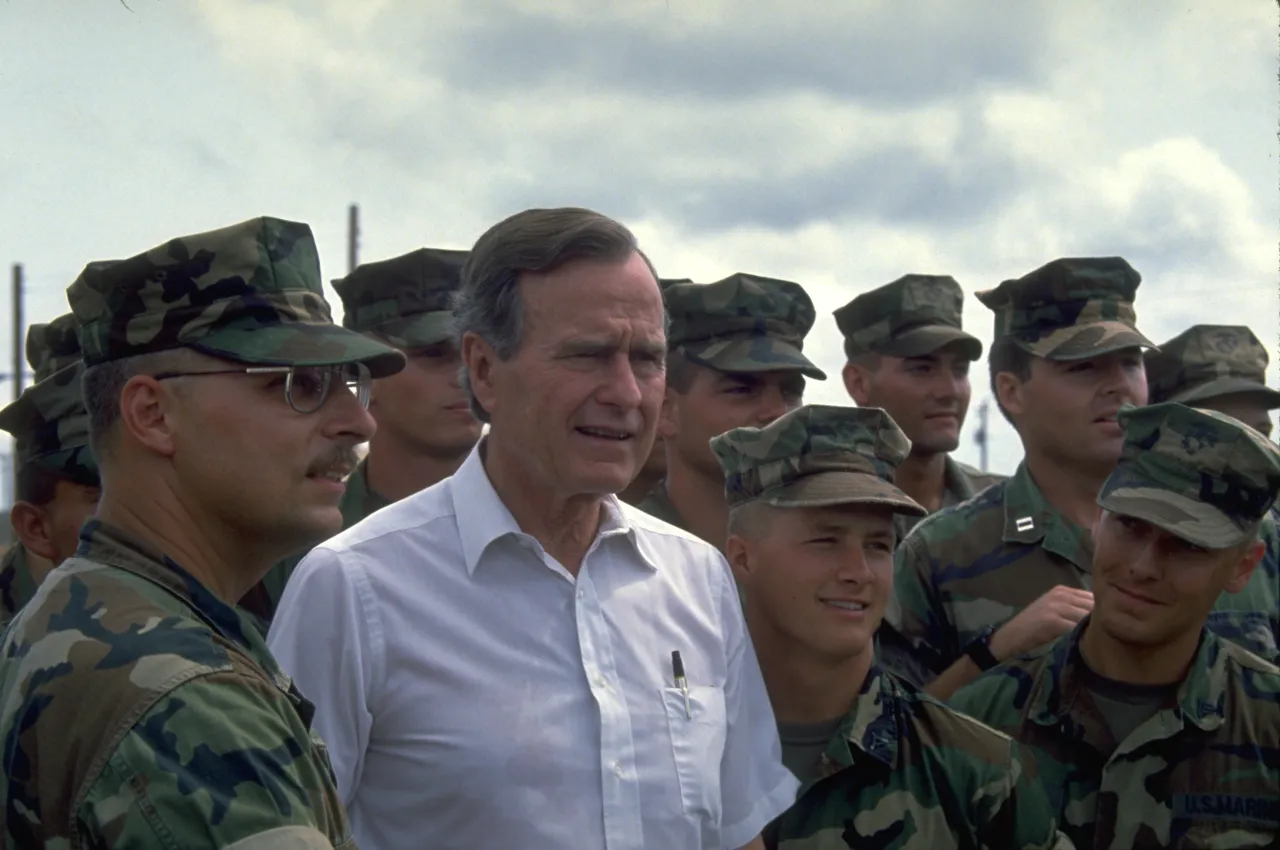 Image: Hurricane Andrew - President Bush poses with military personnel