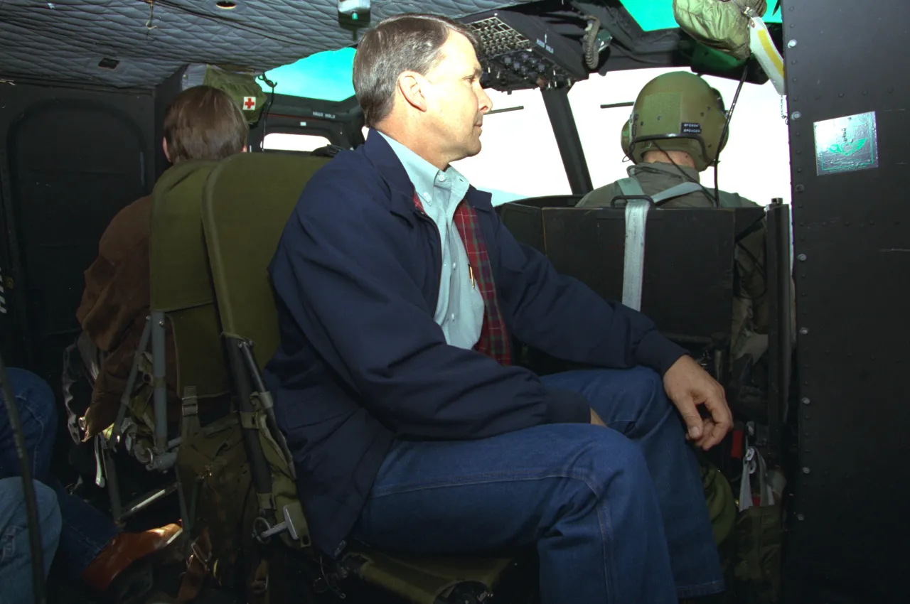 Image: Northridge Earthquake - FEMA Director James Lee Witt in helicopter to view destruction