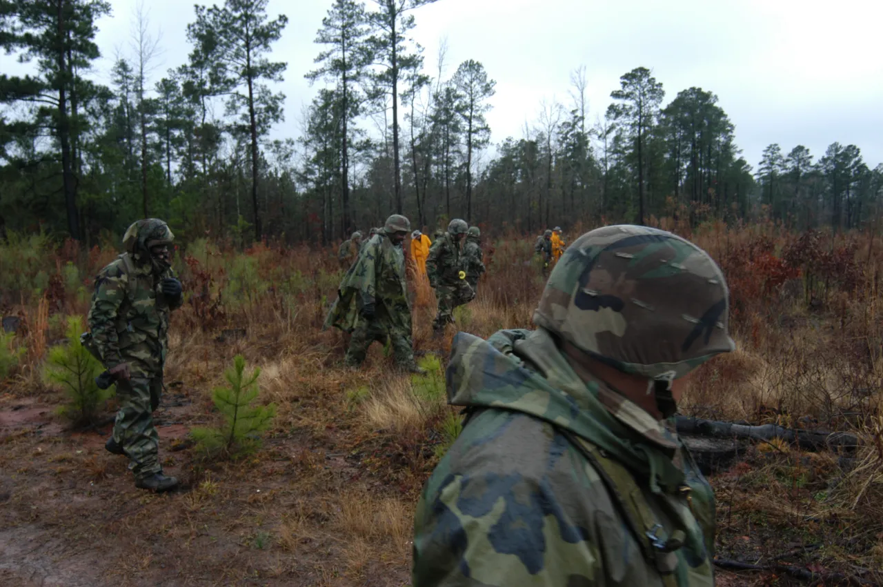 Image: Columbia Shuttle Disaster - National Guard and Texas DPS Officers search for shuttle material