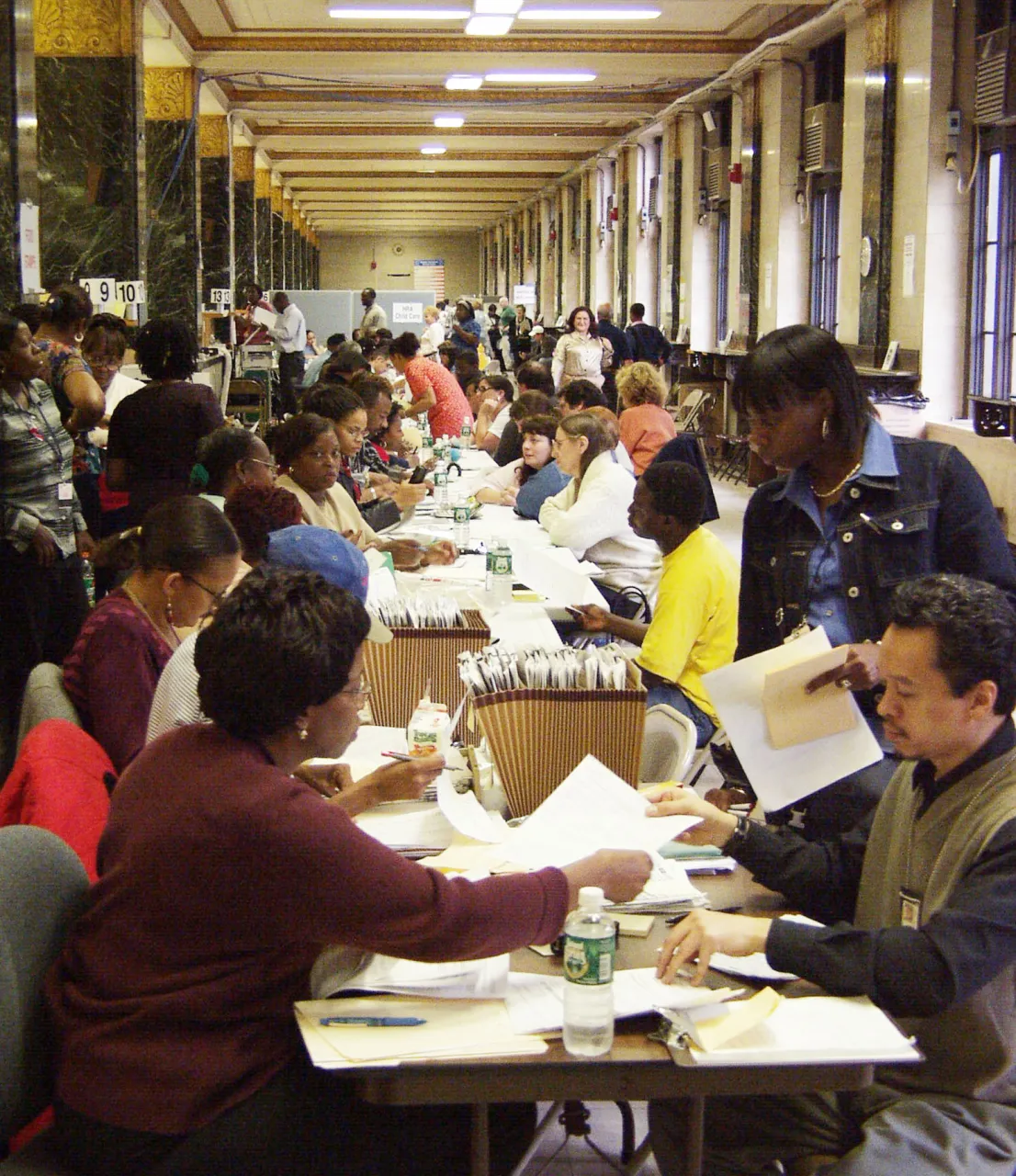 Image: 9/11 - FEMA employees work at the Disaster Assistance Center