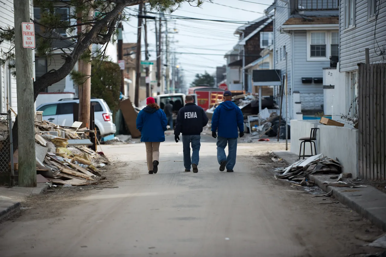 Image: DHS and FEMA Agents Walk Among Hurricane Sandy Rubble