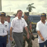 Image: Hurricane Andrew - President Bush is given a tour of a disaster site by FEMA officials