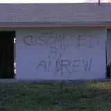 Image: Hurricane Andrew - A wall of a home reads "Customized by Andrew"