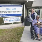 Image: FEMA Employee with a Hurricane Ian Survivor at a Disaster Recovery Center at Barnett Park Recreation Center