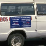 Image: Hurricane Andrew - A vehicle with FEMA's assistance number on the side