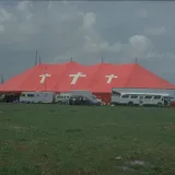 Image: Hurricane Andrew - A Red Cross tent is surrounded by support