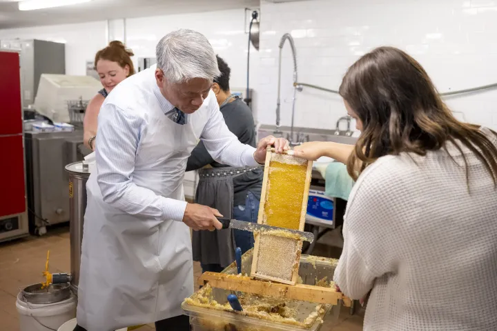 Image: DHS Employees Extract Honey From Bees on Campus (028)