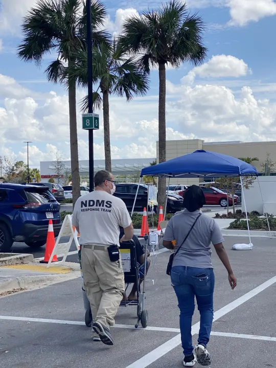 Image: Disaster Medical Assistance Teams Assist Patients Outside of The Gulf Coast Medical Center (2)