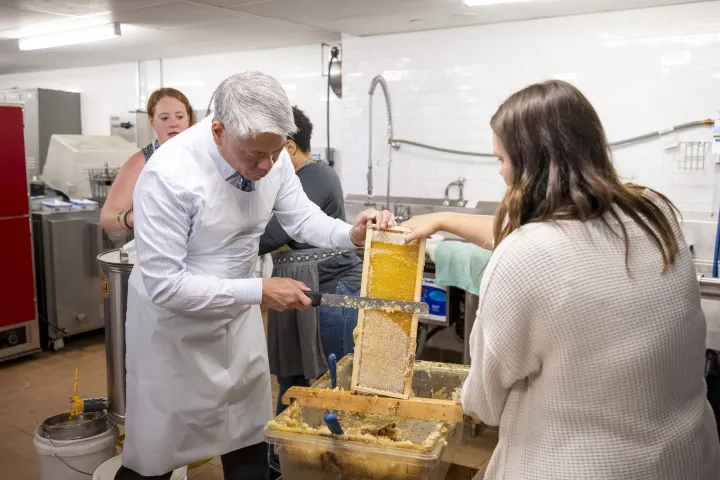 Image: DHS Employees Extract Honey From Bees on Campus (027)