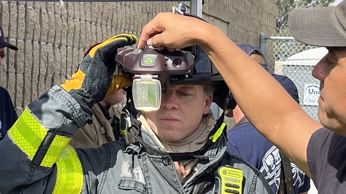 First responder wearing the C-Thru device on top of his helmet.