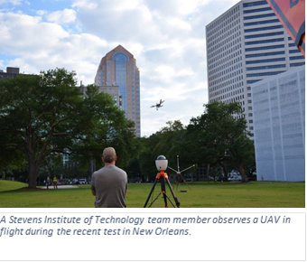 A Stevens Institute of Technology team member observes a UAV in flight during the recent test in New Orleans