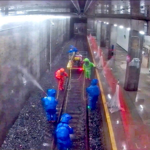 EPA team decontaminating the mock subway’s tunnel.