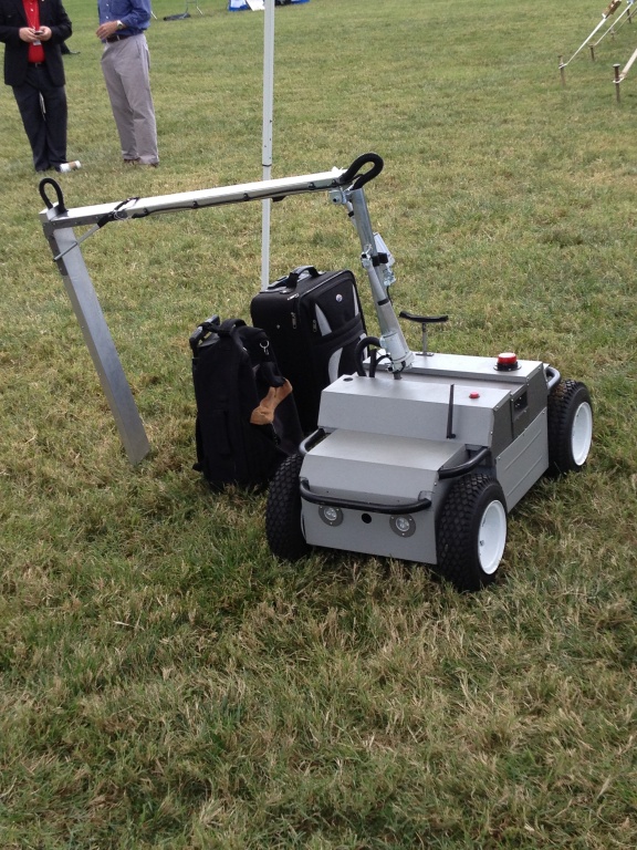 X-ray Scanning Rover demonstrates capabilities by scanning a suitcase.