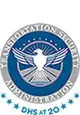 TSA logo with "DHS at 20" below the logo in blue