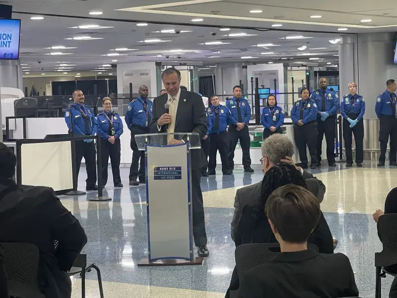 Under Secretary Kusnezov provides remarks to the U.S. Travel Association about S&T’s role in bringing the self-service screening system to life at Harry Reid International Airport in Las Vegas. In the background are several TSA officers.