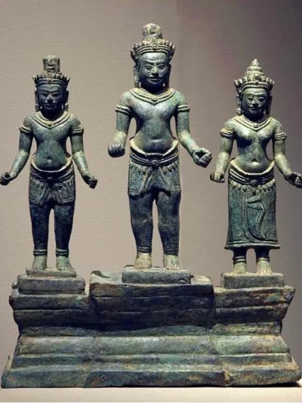 A bronze Shiva triad, which measures 11.75 inches high.