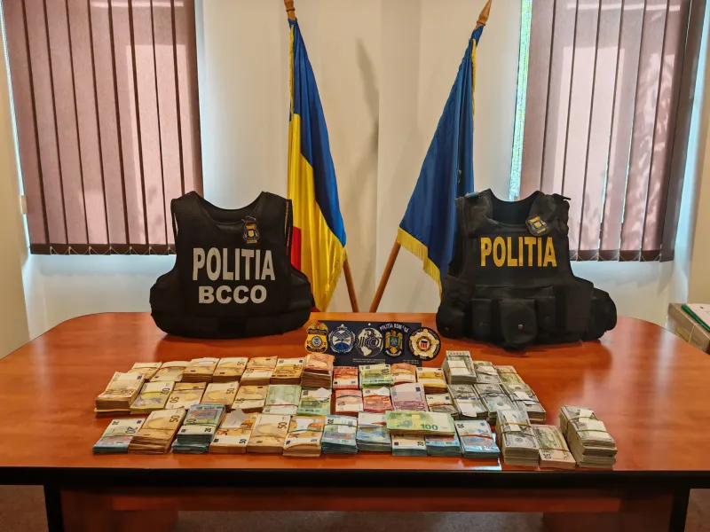 Photo of international law enforcement vests and currency