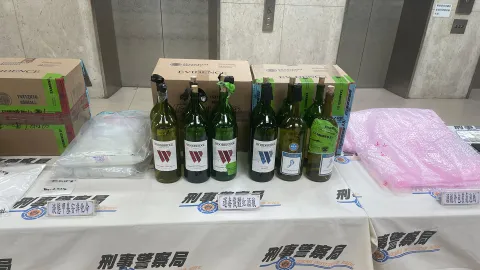 Wine bottles used to smugglers to dissolve crystal methamphetamine in water for transport to Asia.