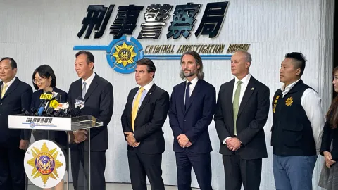 CIB Deputy Director Shin-Hsiung Lin delivered remarks in Mandarin to the members of the press. HSI's Supervisory Special Agent for HSI Taipei stands to the right of Deputy Director Lin. 