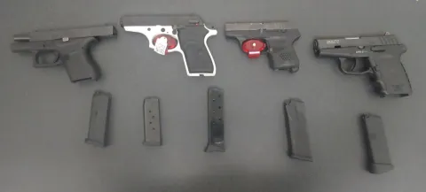 The firearms seized from the defendant at the time of his arrest.