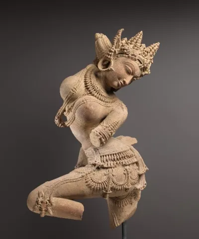 A sandstone sculpture depicting a Celestial Dancer, which was looted from a temple in Madhya Pradesh, India, in the early 1980s.