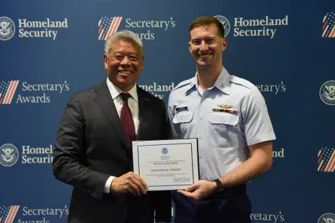 Homeland Security Deputy Secretary John Tien and Team Excellence Award recipient, Christopher M. Cordobes