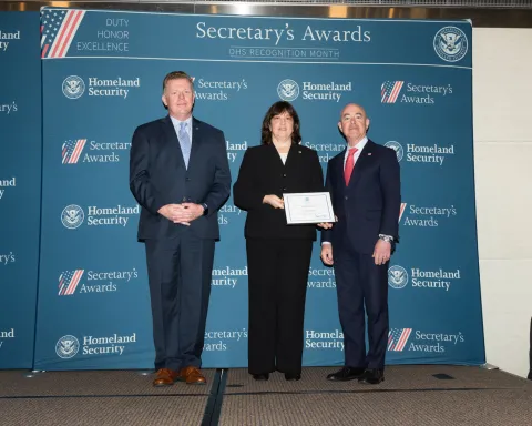 Left to right: U.S. Secret Service Director James Murray, Innovation Award recipient Diana Drysdale, and DHS Secretary Alejandro Mayorkas.
