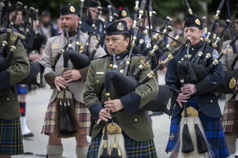 Homeland Security Secretary Alejandro Mayorkas attends the 2022 CBP Honor Memorial event at the Woodrow Wilson Plaza. Members of Customs and Border Protection play bag pipes during solemn occasion.