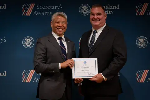 DHS Deputy Secretary John Tien with Innovation Award recipient, Daniel J. Murray.