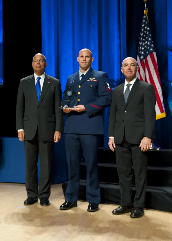 Secretary of Homeland Security Jeh Johnson and Deputy Secretary of Homeland Security Alejandro Mayorkas presented the Secretary's Award for Valor to Petty Officer 2nd Class Robert B. Granger.