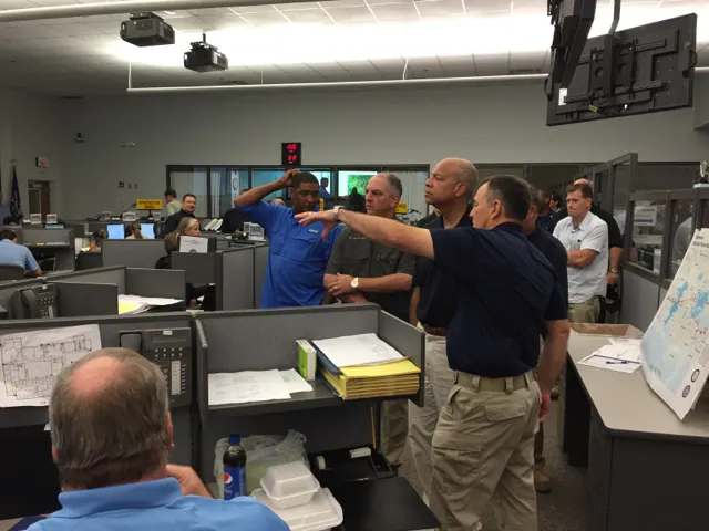 Secretary Johnson is briefed on Emergency Operations Center capabilities and personnel