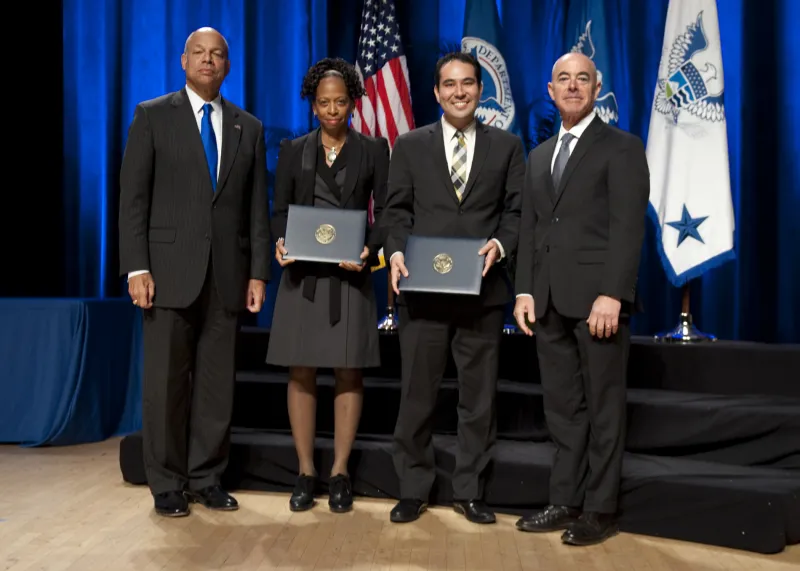 Secretary of Homeland Security Jeh Johnson and Deputy Secretary of Homeland Security Alejandro Mayorkas presented the Secretary's Unity of Effort Award to the Classified Intelligence Forum Team