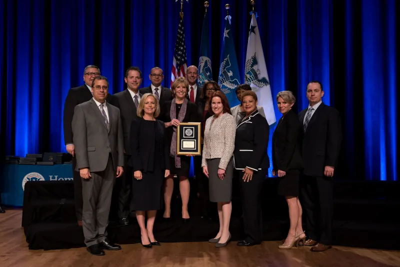 The Secretary's Award for Leadership Excellence 2018 - USCIS Office of Human Capital and Training - For outstanding teamwork in designing and providing programs that provide exceptional leadership development, employee training, and other support services for all levels of USCIS employees.
