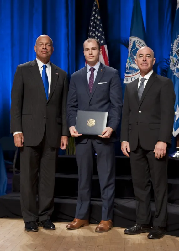 Secretary of Homeland Security Jeh Johnson and Deputy Secretary of Homeland Security Alejandro Mayorkas presented the Secretary's Unity of Effort Award to the Non-traditional Aviation Technologies Whole-of-Community Team