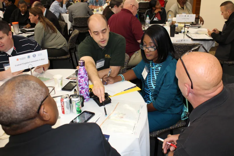 Participants work together to identify vulnerabilities on campus at the 2018 Charlottesville RTTX.