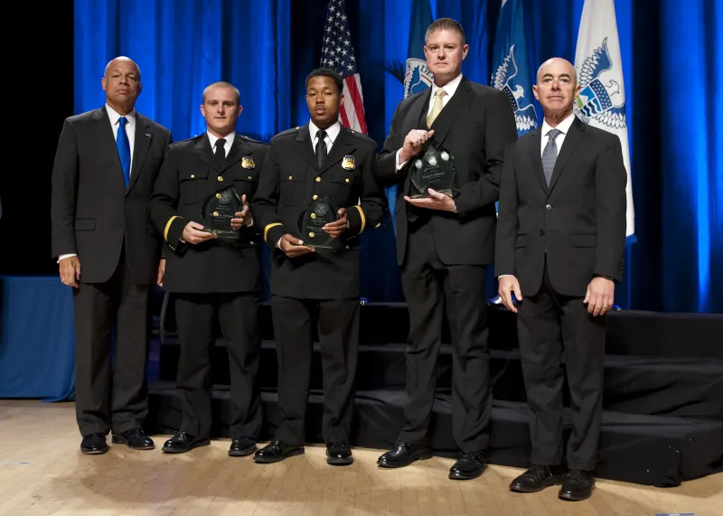 Secretary of Homeland Security Jeh Johnson and Deputy Secretary of Homeland Security Alejandro Mayorkas presented the Secretary's Award for Valor to the U.S. Secret Service agents White House Team Kevin D. Moloney, Joshua L. Johnson, and Matthew R. Williams.