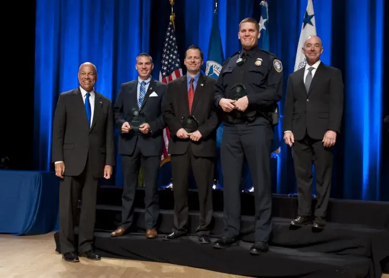 Secretary of Homeland Security Jeh Johnson and Deputy Secretary of Homeland Security Alejandro Mayorkas presented the Secretary's Unit Award to the National Protection and Programs Directorate Umpqua College Active Shooter Response Team Michael Foster, Dustin Smith, Glen Patrick, William Turner, and Douglas Rommes.